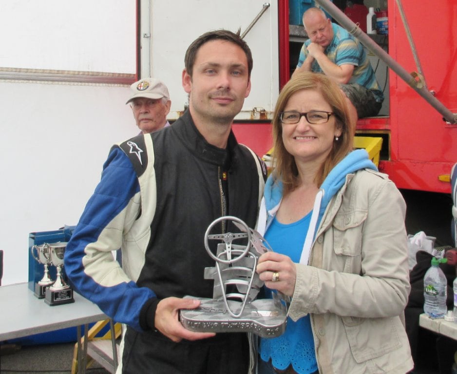James Ford receives his Saturday Twin Spark Cup trophy from Linda Hill